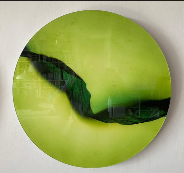 You Tell Me No. 5 features a fluid composition of a texturized substance over a green background in a circular frame.